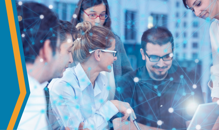 a group of workers collaborate over an IoT design