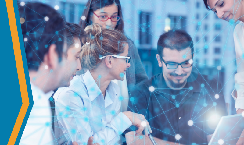 a group of workers collaborate over an IoT design