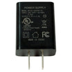 A black rectangular power supply adapter with two metal pins, featuring white printed specifications and certification logos on the front