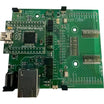 Green electronic circuit board with various components for use with  a GRID32 module